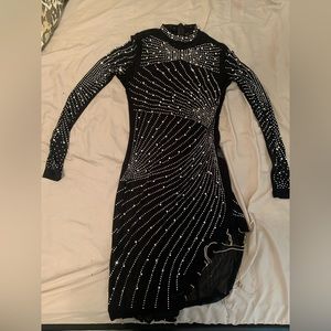 A medium sized club outfit , Branded by Amazon, Sheer material